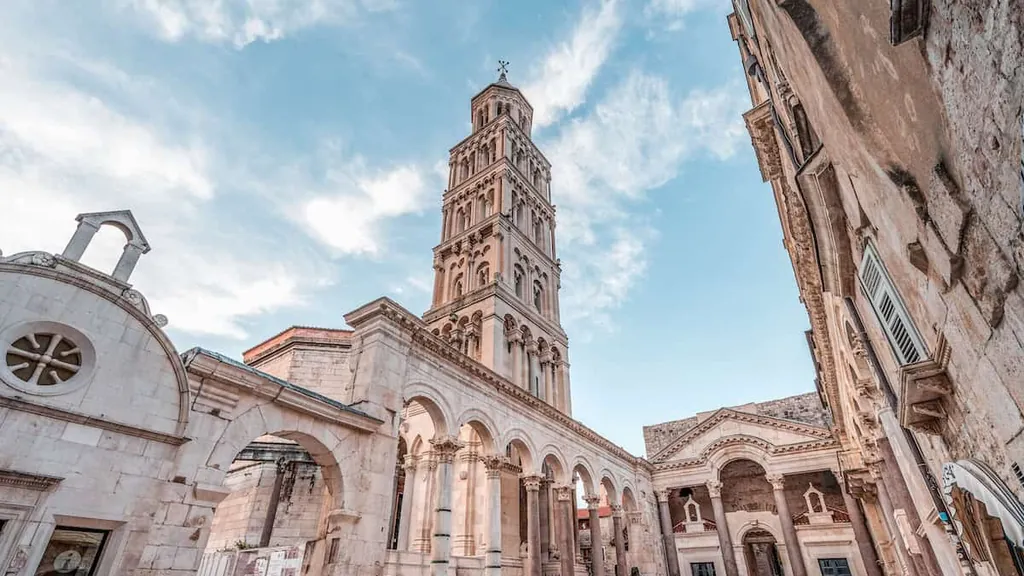 The Peristyle square at the heart of Diocletian's Palace in Split, with the cathedral bell tower above and steps down into the square