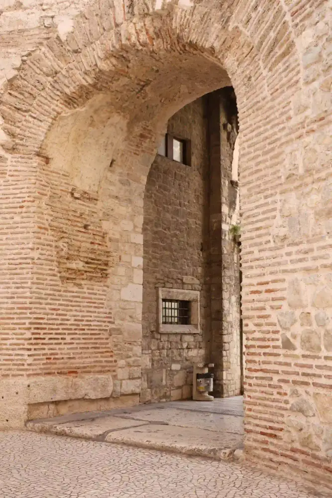 Ancient Roman walls framing a doorway in Diocletian's Palace