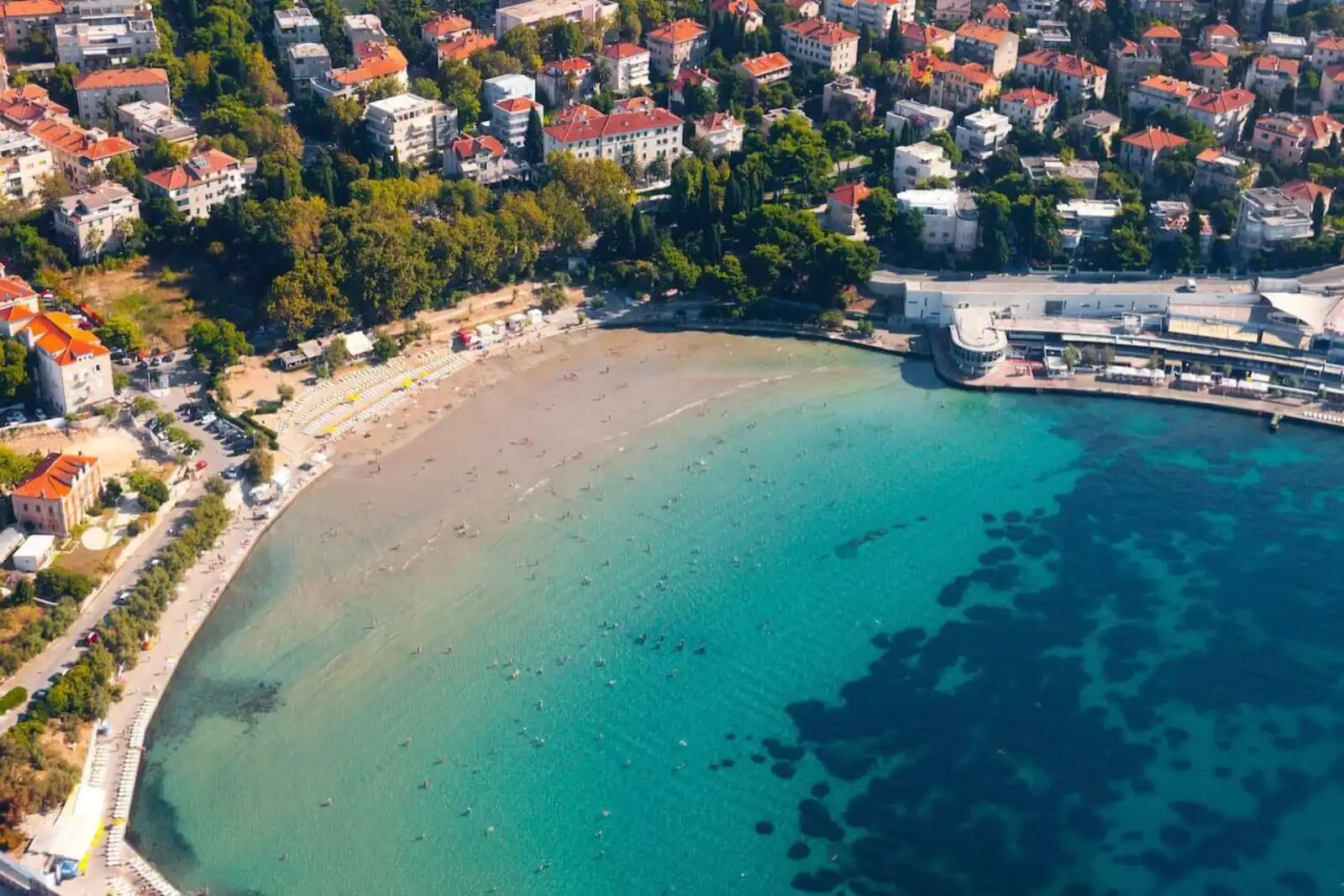 Clear turquoise water at a pebble beach near Split, Croatia