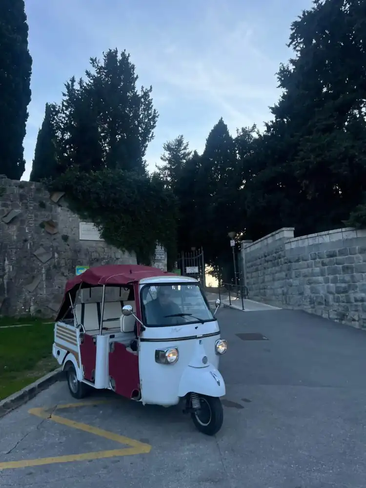 Sunlit smiles during a coastal tuk tuk ride near Split
